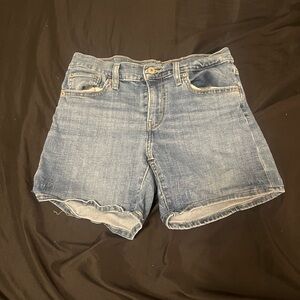 levi’s jean shorts size 28 and are mid thigh